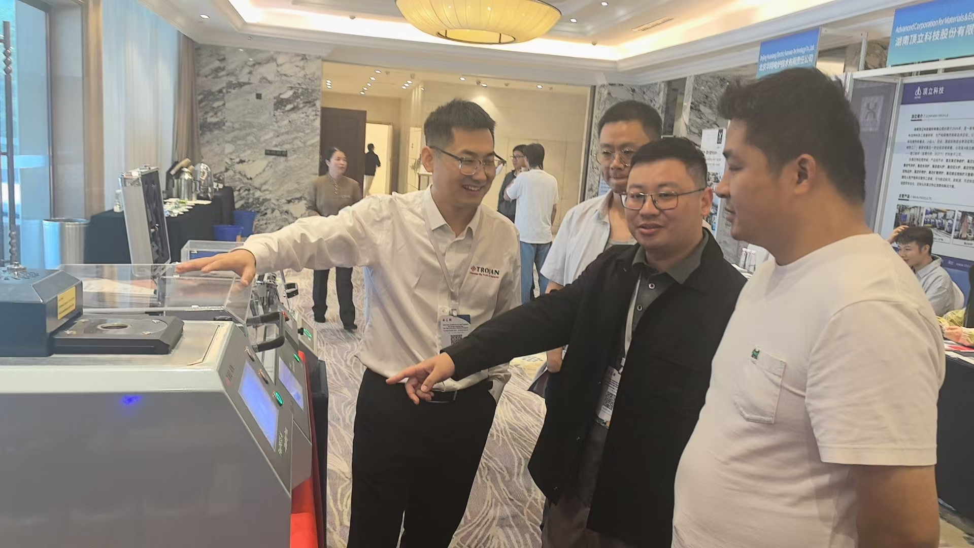Trojan Team Explaining Products to Visitors